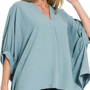Zenana Woven Airflow V-neck Puff Half Sleeve Top